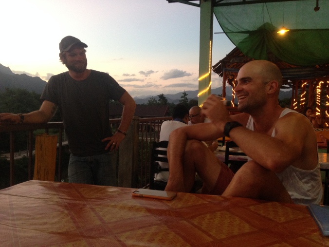 Lucas and Tim enjoying a sunset at Vang Viannne.