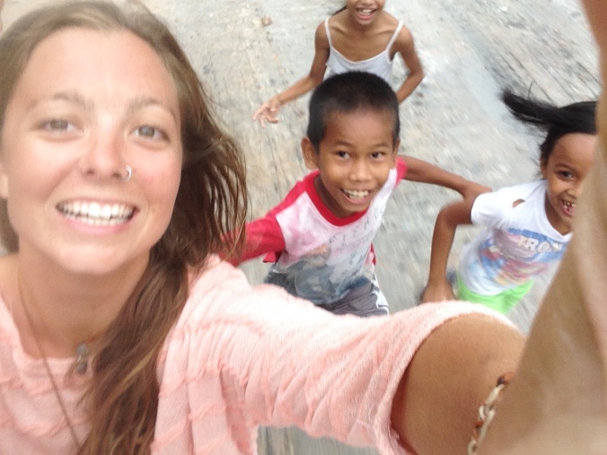 Selfie on the back of a bike with many small followers